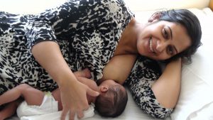 Breastfeeding side by side lying down